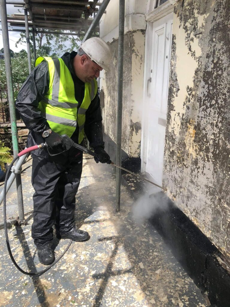 Before and after paint removal from stone using specialist DOFF cleaning